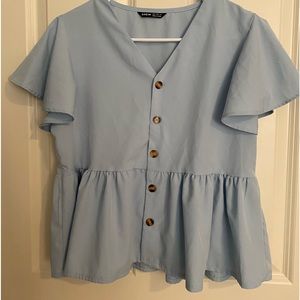 -light blue shirt with buttons